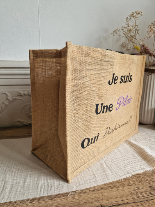 Sac en jute Je suis une pilote qui déchire